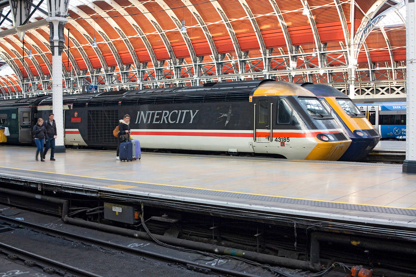 43185, GW 12.00 Bristol Temple Meads-London Paddington (1A16) & 43198, 11.29 Exeter St. David`s-London Paddington ECS (5Z70), London Paddington station 
 43185 'Great Western' looks very smart in its retro. swallow livery and this is the first time that I have managed to photograph it. Here, it sits at Paddington having arrived with the 12.00 from Bristol Temple Meads. Behind it is 43198 'Oxfordshire 2007' that has just stopped at the blocks with the 11.29 ECS run from Exeter St. David's. 
 Keywords: 43185 12.00 Bristol Temple Meads-London Paddington 1A16 43198 11.29 Exeter St. David`s-London Paddington ECS 5Z70 London Paddington station