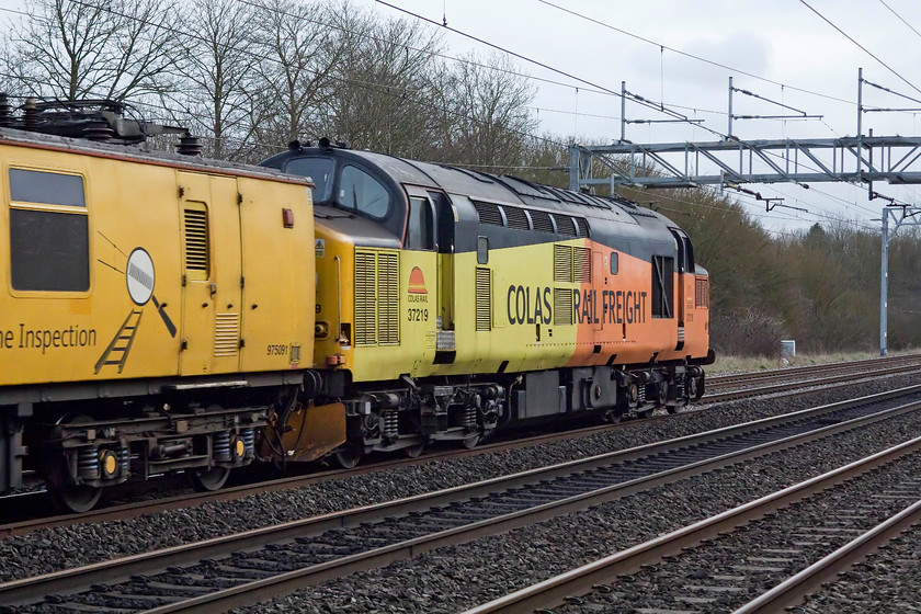 37219, 10.43 Woking-Derby RTC (1Z65, 45E), Bradwell SP831391 
 Running a lot earlier than expected, I was lucky to capture the 10.43 Woking to Derby RTC test train at Bradwell in Milton Keynes. Here, 37219 in Colas Rail Freight livery brings up the rear of the working. 
 Keywords: 37219 10.43 Woking-Derby RTC 1Z65 Bradwell SP831391