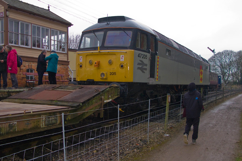 47205, 13.00 ex Pitsford & Brampton station, Pitsford & Brampton station 
 Having alighted from our train, the 12.00 Pitsford and Brampton return working, the 13.00 makes ready to leave with 47205 leading. To the left of the train is the former Little Bowden signal box that is now rebuilt and renamed Pitsford and Brampton. 
 Keywords: 47205 13.00 Pitsford & Brampton station Pitsford & Brampton station