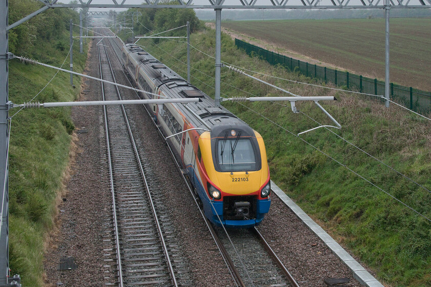 222103, EM 08.05 London St. Pancras-Nottingham (1D11, 1E), Gooseys bridge 
 A grab shot over the gross parapet of the 'new' bridge installed to accommodate the electrification wiring shows 222103 at speed with the 08.05 St. Pancras to Nottingham. Yet another photograph taken in May with cold and wet weather predominating; a feature of spring 20121! 
 Keywords: 222103 08.05 London St. Pancras-Nottingham 1D11 Gooseys bridge EWMR East Midlands Railway Meridian