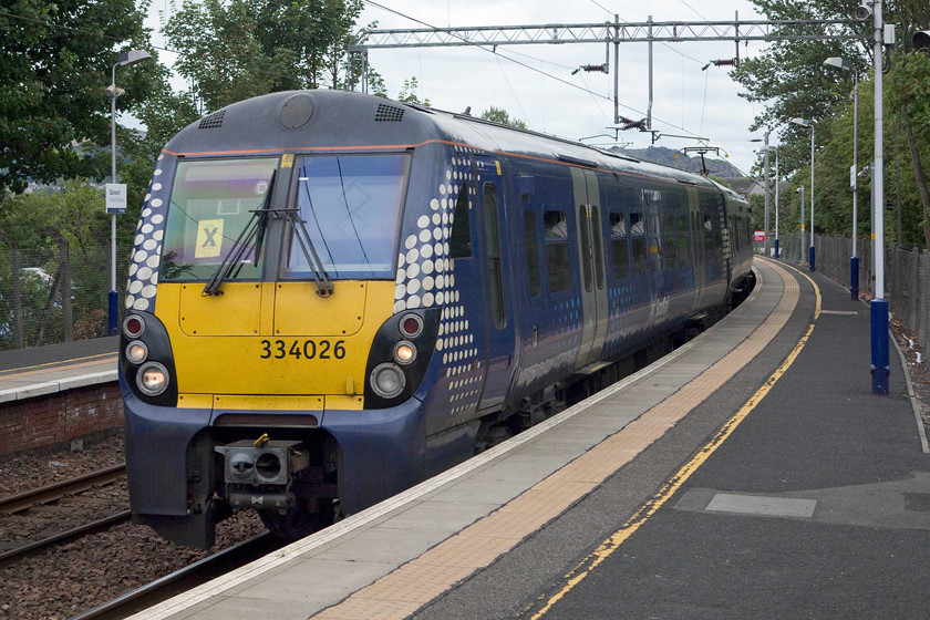 334026, SR 13.16 Airdrie-Balloch (2E55, 4L), Dalreoch station 
 334026 comes to a halt at Dalreoch station forming the 13.16 Airdrie to Balloch. Andy and I took this train to its destination. Balloch is situated at the southern end of Loch Lomond and is a very popular international tourist honey-pot. 
 Keywords: 334026 2E55 Dalreoch station