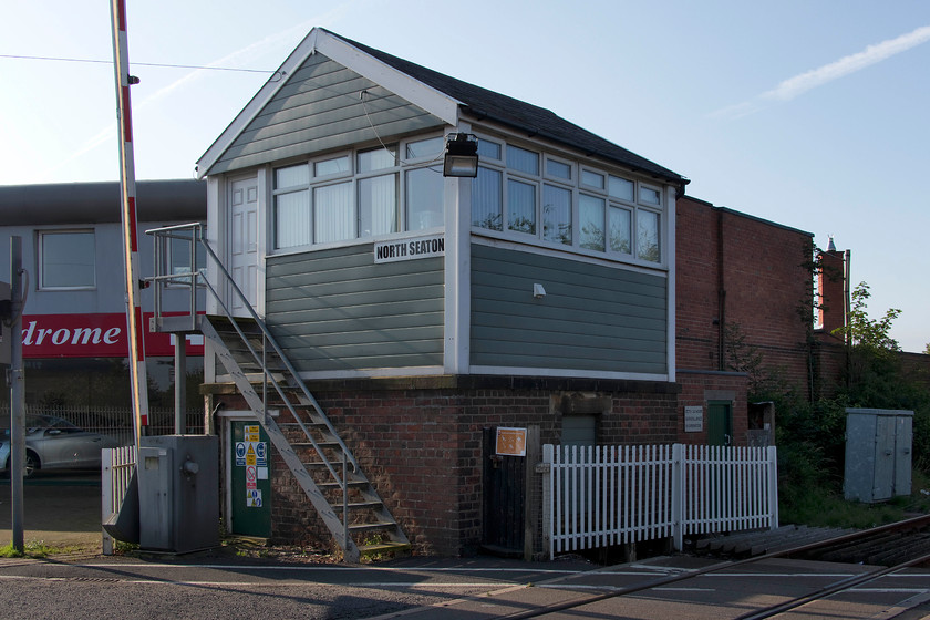 North Seaton signal box (NE, c.1872) 
 The name North Seaton, as applied to this signal box, is a bit of a misnomer as it is actually located in the town of Ashington with its namesake some two miles to the east. Whilst the box has been clad in UPVC with a B&Q front door, underneath it dates from somewhere around 1872 and is a typical North Eastern Railway design. It has now been reduced to the lowly status of a gate box, controlling the level crossing in the foreground. Formerly, it controlled the branch to North Seaton Colliery which left the Blyth and Tyne line just north of North Seaton Viaduct, as well as North Seaton Station. 
 Keywords: North Seaton signal box