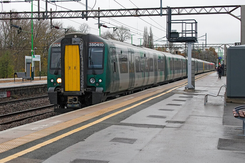 350410, LN 09.06 Birmingham New Street-London Euston (1Y26, 5L), Northampton station 
 Former TPE Desiro 350410 (the highest number of all the class) leads the 09.06 Birmingham New Street to Euston into Northampton station. My wife and I took this service to the capital finding the train unusually quiet. 
 Keywords: 350410 09.06 Birmingham New Street-London Euston 1Y26 Northampton station London Northwestern Desiro