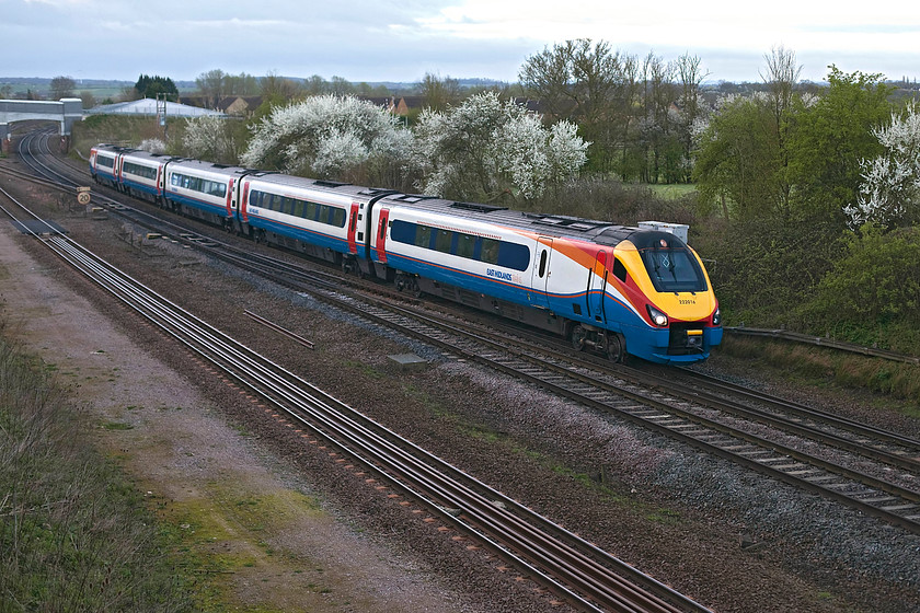 222016, EM 06.37 London St.Pancras-York (1F05, 3L), Sharnbrook Junction Tl002598 
 222016 begins its climb to Sharnbrook Summit forming the 06.37 London St. Pancras to York. The scene has been brightened up a bit by the profusion of blossom on the Blackthorn (Prunus spinosa) behind the train. 
 Keywords: 222016 1F05 Sharnbrook Junction Tl002598