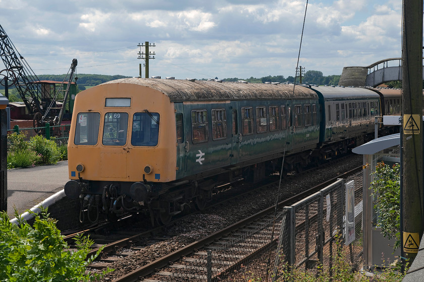 E56358 & E51213, stabled, Chappel & Wakes Colne station 
 A preserved class 101 DMU composed of E56358 and E51213 sit at the East Anglian Railway Museum platform at Chappel and Wakes Colne station. This DMU actually worked the line when they were in BR service so have, in a sense, returned home! Today, they operate on the small demonstration line on selected running days. 
 Keywords: E56358 E51213 Chappel & Wakes Colne station