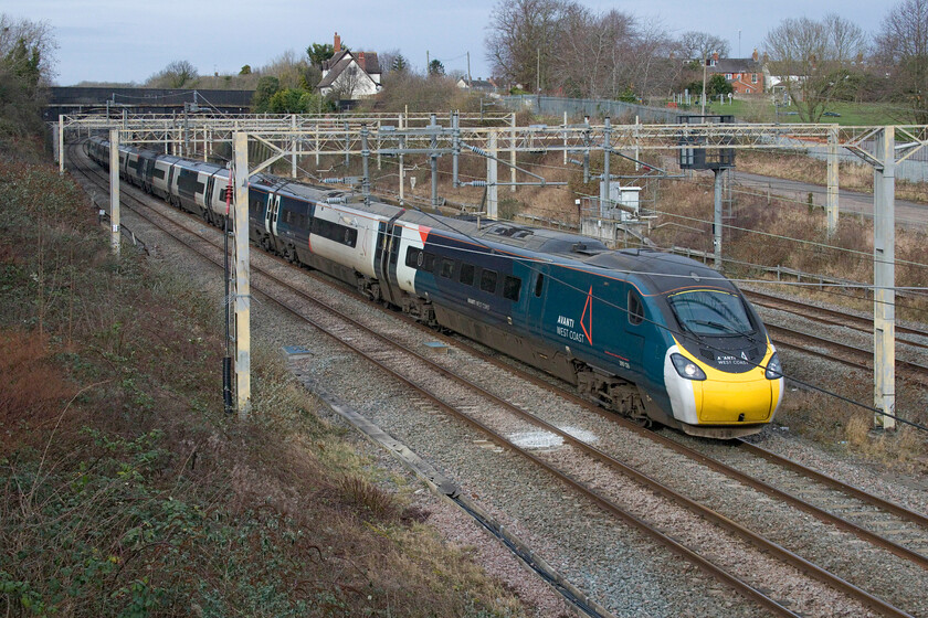 390126, VT 07.35 Glasgow Central-London Euston (1M08, 1E), site of Roade station 
 Just catching a little weak sunshine 390126 passes Roade working AWC's 07.35 Glasgow Central to Euston service. 
 Keywords: 390126 07.35 Glasgow Central-London Euston 1M08 site of Roade station Avanti West Coast AWC