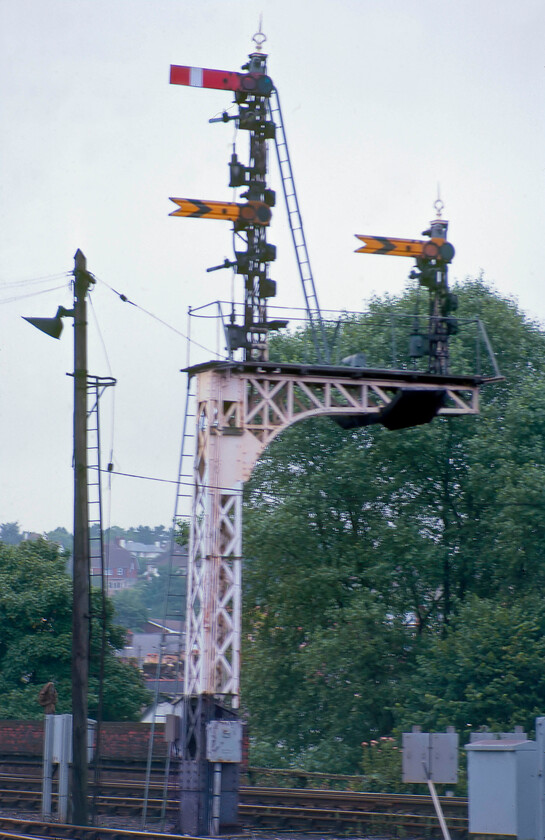 Up starter bracket, Salisbury station 
 Technically not the best quality but I have included this photograph of Salisbury East's up bracket signal for historical interest. The rather grand latticed structure controlled departures from the station and the east yard towards the next block post at Salisbury Tunnel Junction. Access for the seventeen-year-old photographer was permitted by railway staff after the issuing of an orange tabard following a quick safety talk regarding avoiding venturing on to running lines; it was so much simpler back then! 
 Keywords: Up starter bracket Salisbury station