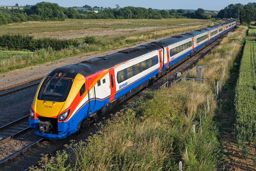 222009 & 222011, EM 18.00 London St. Pancras-Melton Mowbray, Harrowden Junction 
 An interesting anomaly of East Midlands Trains' timetable is the twice-daily service that operates to and from Melton Mowbray. A commuter service leaves the Leicestershire town in the morning travelling via Manton Junction, crossing Harringworth viaduct to then join the MML at Glendon Junction. The balancing working (18.00 ex St. Pancras) operates in the evening and is seen here passing Harrowden Junction worked by 222009 and 222011. Both the outward and return services run as empty stock to and from Melton from Etches Park (Derby) taking Syston North Junction. 
 Keywords: 222009 222011 18.00 London St. Pancras-Melton Mowbray Harrowden Junction EMT East Midlands Trains meridian