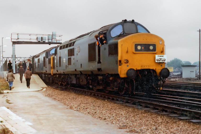 37204 & 37282, outward leg of The Pennine Explorer, Cardiff Central-Rotherwood, Gloucester station (Courtesy of David-Brush) 
 A scan of the print rather than from the negative shows 37204 and 37282 waiting to leave Gloucester with the outward leg of 'The Pennine Explorer'. These were the days when enthusiasts were allowed off the end of the platforms in order to get their pictures before the railway gestapo banned this activity. This picture was given to me by David Brush who was travelling with our party. 
 Keywords: 37204 37282 The Pennine Explorer Cardiff Central-Rotherwood Gloucester station Courtesy of David-Brush