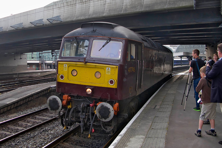 47746, London Paddington-Southall light engine, London Paddington station 
 After bringing the stock into Paddington station with 70000 'Britannia' on the rear 47746 runs out again back towards West Coast's Southall facility with the railtour having left for Minehead. This particular Class 47 is almost the same age as me having been released into traffic in August 1964. 
 Keywords: 47746 London Paddington-Southall light engine London Paddington station West Coast Railways