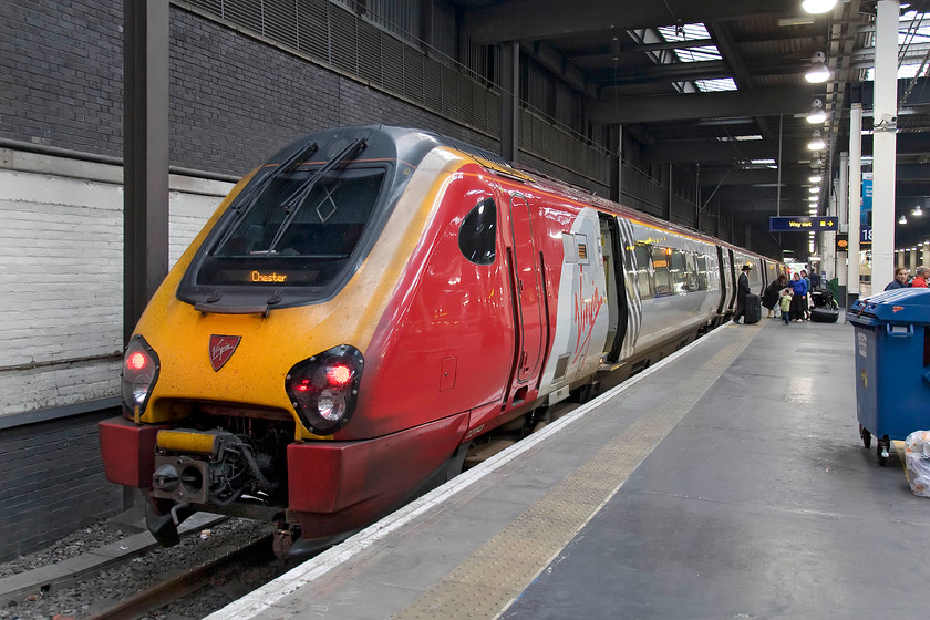 221143, VT 17.35 Chester-London Euston (1A58), London Euston station 
 221143 'Auguste Picard' rests on the stops at London Euston's platform eighteen with passengers alighting no doubt cursing the long walk to the concourse from this remote and desolate part of the terminus. Andy and I had travelled down from Milton Keynes on this service, the 1A35 17.35 from Chester. 
 Keywords: 221143 17.35 Chester-London Euston 1A58 London Euston station Virgin Trains Voyager Auguste Picard