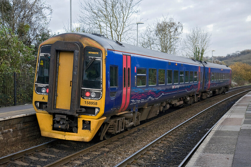 158958, GW 12.50 Great Malvern-Weymouth (2O90), Freshford station 
 The second photograph of 158958 as it pauses at Freshford station working the 12.50 Great Malvern to Weymouth service. Whilst Freshford station is a little small and somewhat bereft of facilities the next station that the unit will stop at is even more basic! Avoncliff halt is just one and a half carriages long with wooden platforms and is mere three minutes travelling time from here on the other side of the River Avon at Freshford. 
 Keywords: 158958 12.50 Great Malvern-Weymouth 2O90 Freshford station FGW First Great Western