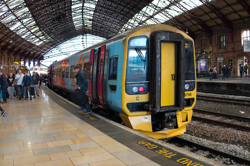 158798, GW 08.23 Portsmouth Harbour-Bristol Parkway (1F10), Bristol Temple Meads station 
 158798 sits under Temple Meads' fine trainshed having just arrived with the 08.23 from Portsmouth Harbour that will soon reverse to complete its journey at Bristol Parkway. My wife, son and I travelled on this train from Westbury, 
 Keywords: 158798 08.23 Portsmouth Harbour-Bristol Parkway 1F10 Bristol Temple Meads station