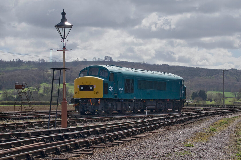 45149, stabled, Toddington Yard 
 Sitting in the spring sunshine at the end of Toddington's yard 45149 awaits its next turn. The ETH Class 45 was one of the final few to be withdrawn in the autumn of 1987 after receiving its unofficial name of 'Phaeton' that it only wore for some three weeks! Following a failed traction motor it was withdrawn and languished at Cricklewood shed for some years before passing from pillar to post with every intention of some sort of restoration taking place but nothing actually happening! Finally, the much-needed rebuild commenced in 1997, a process that would take over ten years to complete! It is now a regular performer on the preserved line. 
 Keywords: 45149 stabled Toddington Yard Gloucestershire and Warwickshire Railway Phaeton