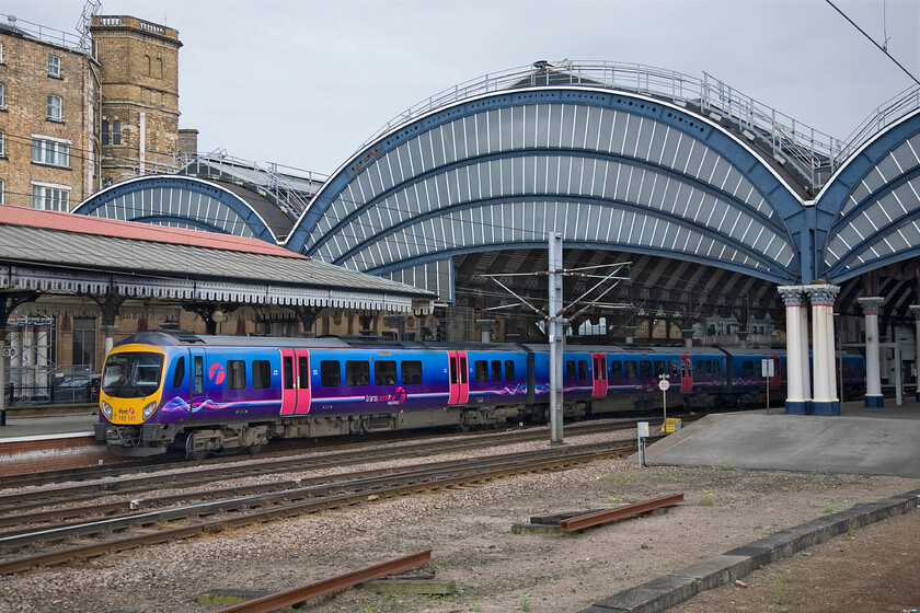 185141, TP 15.50 Scarborough-Liverpool Lime Street (1F81), York station 
 TPE's 185141 arrives at York station forming the 15.50 Scarborough to Liverpool train. I am not a particular fan of these units but I know that they are highly rated by crews and passengers alike with their high fuel consumption being their Achilles heel. However, they do follow quite taxing routes especially when crossing the Pennines such as this one will do in an hour or so. 
 Keywords: 185141 15.50 Scarborough-Liverpool Lime Street 1F81 York station TPE TransPennine Express