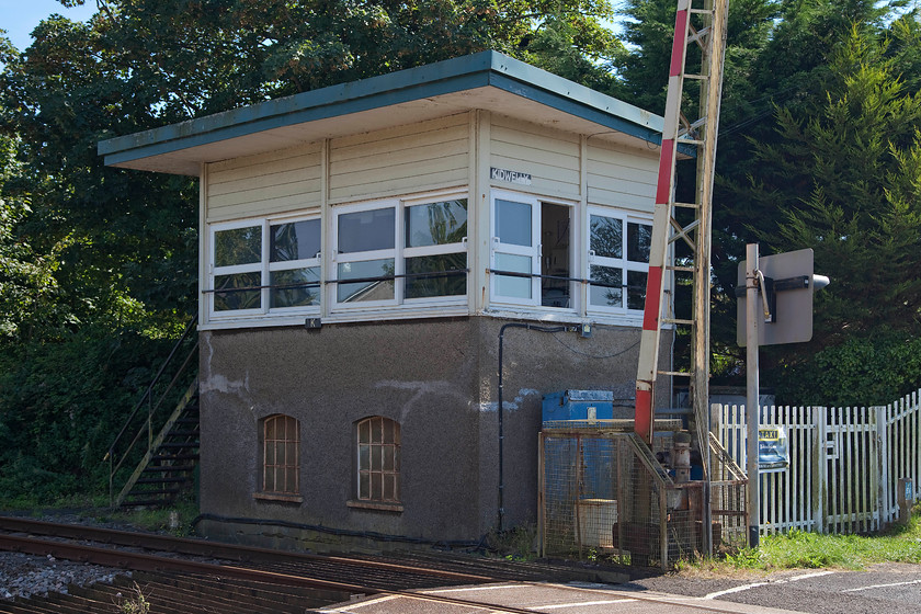 Kidwelly signal box (BR, 1950s) 
 Sounding like a Flanders and Swan song, the delightfully named Kidwelly signal box is not an attractive structure. However, looks can be deceiving as the base, even though it's been rendered is in fact the original 1885 GWR structure. The top and pitched flat roof were added by BR in 1950. It contains a mini panel that controls the signalling and the level crossing but it's still absolute block all the way, next box west is Ferryside. 
 Keywords: Kidwelly signal box