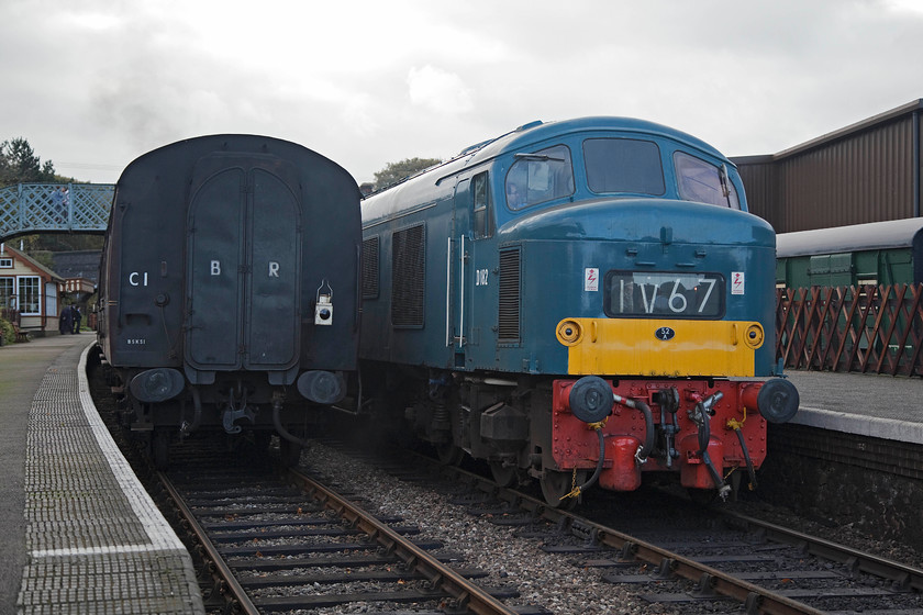 D182 (46045), 15.35 Holt-Sheringham, Weybourne station 
 D182 leaves Weybourne with the 15.35 Holt to Sheringham. It is in British Railways' 'economy' blue livery with a small yellow warning panel that was applied to eleven members of the class. It was nice to see the Peak in action as this was the last day of use on the line after its summer season sojourn. 
 Keywords: D182 46045 15.35 Holt-Sheringham Weybourne station