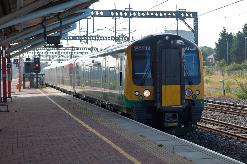 350238, LM 07.46 London Euston-Crewe (1U25), Rugby station 
 350238 leads another Desiro into Rugby station as the 1U25 07.46 Euston to Crewe. My Brompton bike and I took this train to Crewe along with lots of enthusiasts also attending the DRS open day. 
 Keywords: 350238 07.46 London Euston-Crewe 1U25 Rugby station