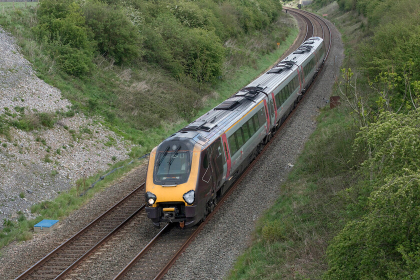 220032, XC (for GW) 12.47 Swindon-Bristol Temple Meads (1Z19, 1L), Thingley ST890700 
 Unfortunately, avoiding the sunshine at Thingley Junction CrossCountry Voyager 220032 heads back towards Bristol Temple Meads with the 12.47 1Z19 ex Swindon shuttle service. The very unusual sight of a XC Voyager on this section of the GWML was as a result of the temporary withdrawal from service of the Class 800 IETs amid safety concerns enabling them to be fully checked at depots. Unfortunately, these inspections revealed large cracks where the aluminium body jacking mounts are welded to the body of the units and to which the yaw dampers are also attched. 
 Keywords: 220032 12.47 Swindon-Bristol Temple Meads 1Z19 Thingley ST890700 CrossCountry Voyager GWR Great Western Railway