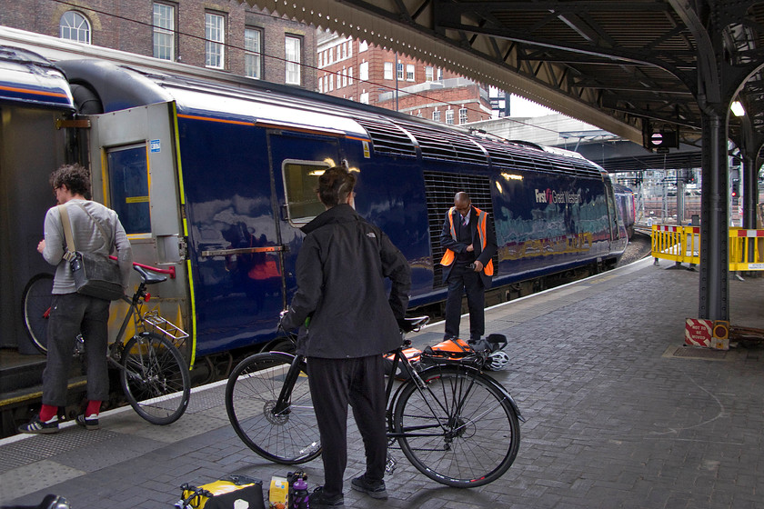 43133, GW 10.06 London Paddington-Penzance, `The-Cornish-Riviera` (1C77), London Paddington station 
 It's pleasing to see bicycles being loaded on to a train with relative ease. On many modern trains, the provision of bike spaces is extremely poor and with many needing compulsory pre-booking. The concept of integrated transportation methods is not exactly encouraged by these retrograde steps. 43133 will soon lead the down 'Cornish Riviera' away from Paddington as the fabled 1C77. However, its departure time is now somewhat earlier than in the past as the 10.06 to Penzance. My boss and I took this service to Bodmin Parkway and enjoyed a very comfortable trip indeed. 
 Keywords: 43133 10.06 London Paddington-Penzance, `The-Cornish-Riviera` 1C77 London Paddington station First Great Western FGW HST