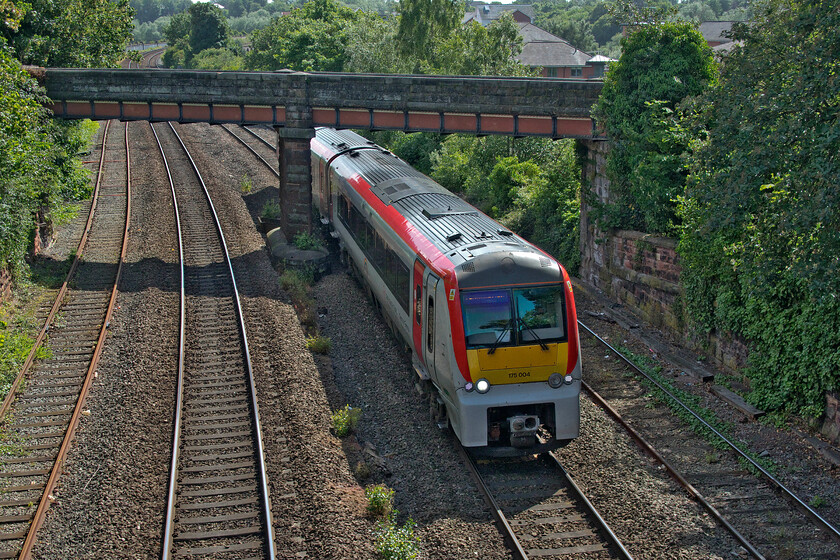 175004, AW 14.40 Llandudno-Manchester Airport (1H90, 42L), Bonewaldesthorne's Tower Chester city wall 
 Enjoying a complete circular walk of the city walls I revisited a spot that I went to two days previously, 175004 approaches Chester from the west with the 14.40 Llandudno to Manchester Airport TfW service. The location is adjacent to Bonewaldesthorne's Tower, a medieval structure dating from 1249. 
 Keywords: 175004 14.40 Llandudno-Manchester Airport 1H90 Bonewaldesthorne's Tower Chester city wall TfW Transport for Wales