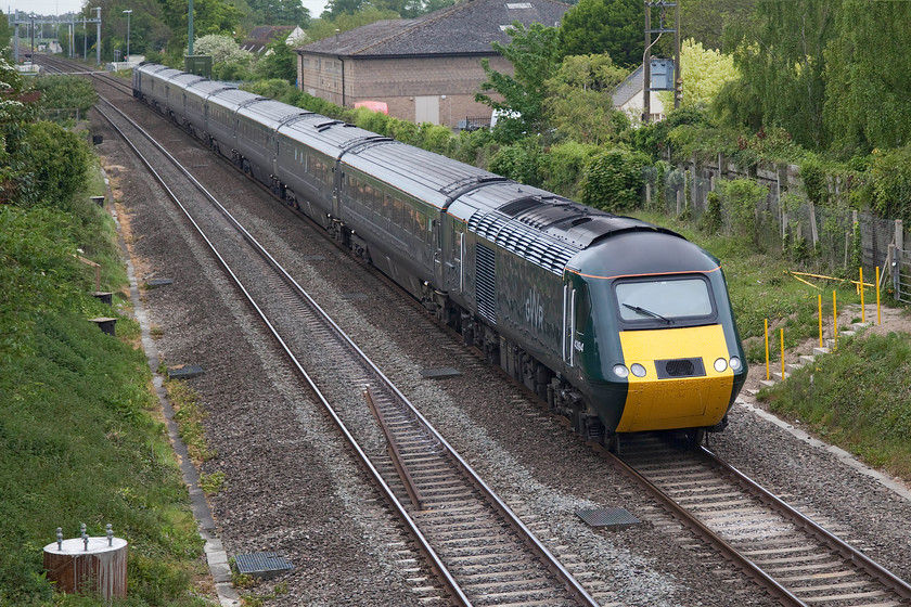 43194 & 43028, GW 12.30 Bristol Temple Meads-London Paddington (1A17, 2L), Steventon 
 The village of Steventon is just west of Didcot and is completely divided by the railway. There are three crossings of the tracks and this is the only one that's a bridge meaning the others are heavily used level crossings. 43194 at the front with 43028 at the rear passes with the 12.30 Bristol Temple Meads HST service. 
 Keywords: 43194 43028 1A17 Steventon