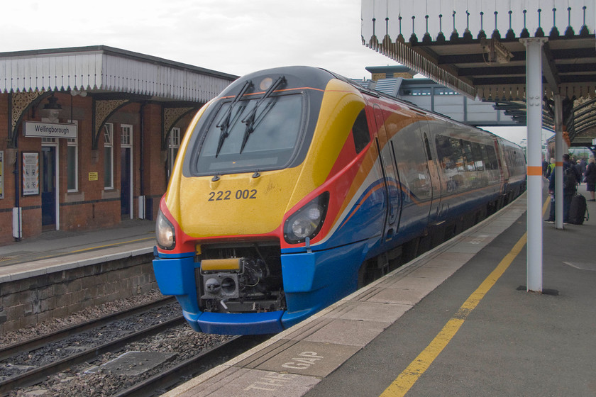 222002, 06.32 London St. Pancras-Sheffield (1F05), Wellingborough station 
 Our train north arrives at Wellingborough station. 222002 is working the 06.32 St. Pancras to Sheffield that my boss and I took as far as its desination. 
 Keywords: 222002 06.32 London St. Pancras-Sheffield 1F05 Wellingborough station East Midlands Trains Meridian