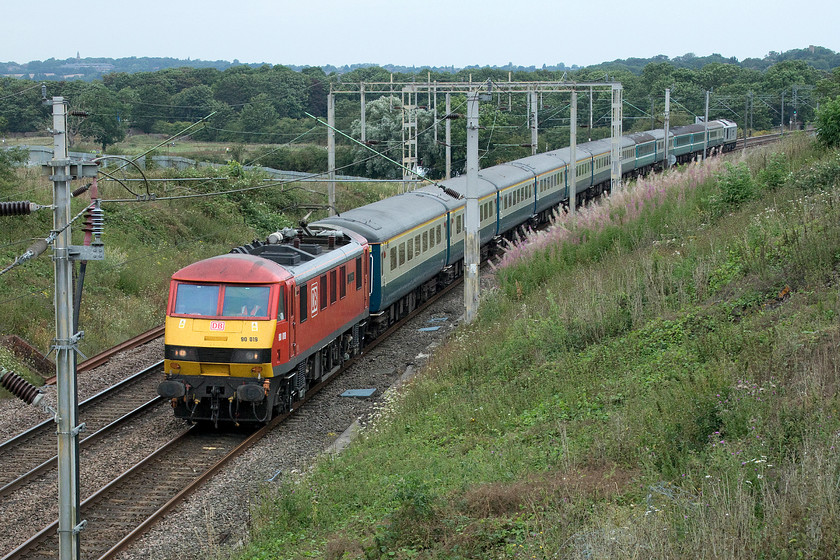 90019, 09.18 Liverpool South Parkway-Wembley Central footex (1Z90), Milton Malsor SP738560 
 DB's 90019 'Multimodal' leads the 09.18 Liverpool South Parkway to Wembley Central football charter past Milton Malsor just south of Northampton. Inside the Mk. IIF stock, leased from Riviera Trains, are Liverpool fans travelling down to Wembley for their teams Community Sheild season opener with Manchester City, who did not charter a train for their fans! At the rear of the train is 67029 ' Royal Diamond'. 
 Keywords: 90019 09.18 Liverpool South Parkway-Wembley Central footex 1Z90 Milton Malsor SP738560