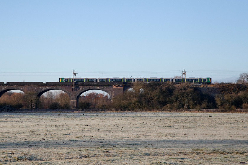 Class 350, LM 07.54 London Euston-Birmingham New Street (2Y17, 1L), Haversham SP818425 
 Haversham viaduct is located just north of Wolverton station and crosses the shallow valley that contains the River Great Ouse. On a beautiful bright, frost and crisp late autumn morning, a class 350 crosses the viaduct with the 07.54 Euston to Birmingham New Street. 
 Keywords: Class 350 07.54 London Euston-Birmingham New Street 2Y17 Haversham SP818425