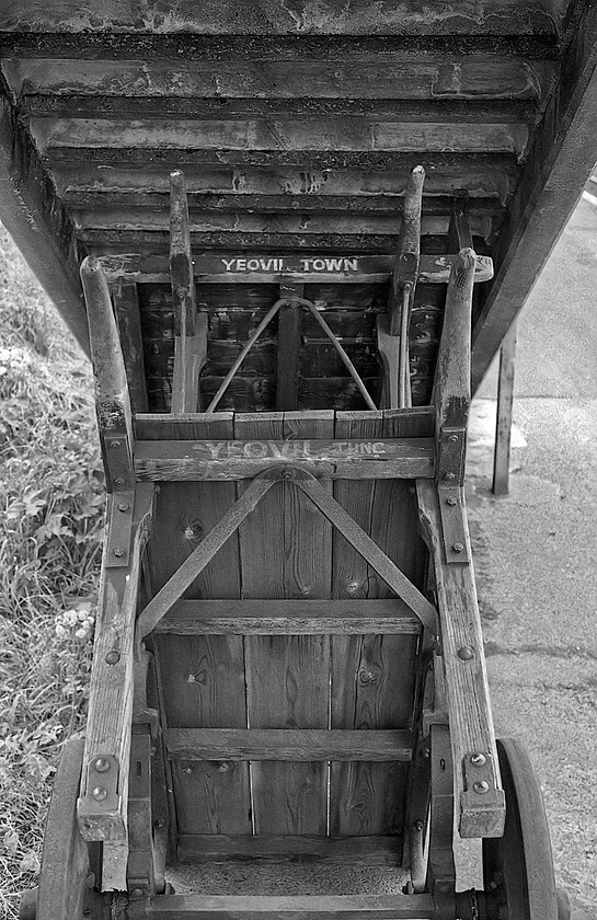 Former SR sack barrow, Gillingham station 
 The heritage of this sack barrow stored under Gillingham's (Dorset) footbridge is of questionable history. While being at Gillingham it firmly places it in L&SW/Southern territory the fact that one of the sign writing indicates Yeovil Town suggests that it may be of GWR heritage. However, to throw further doubt the other writing on the barrow says Yeovil Junction so it is back to the Southern. Either way, it was interesting to find this item and I wonder where it ended up? Yeovil Town station was one of three stations in the Somerset town that once existed and was closed in 1964, two still remain, Pen Mill and Junction. 
 Keywords: Former SR sack barrow Gillingham station