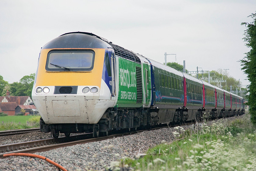 43126, GW 13.30 London Paddington-Bristol temple Meads (1C16, 3E), Steventon 
 43126 wore this unusual and very distinctive livery for quite sometime after the Bristol 2015 European Green Capital award had been given. It certainly made it an instantly recognisable power car! It is seen here passing just west of Steventon with the 13.30 Paddington to Bristol Temple Meads. 43126 was an early member of the third Western Region batch of HSTs, being initially part of set 253028 that was introduced in the summer of 1979. 
 Keywords: 43126 1C16 Steventon