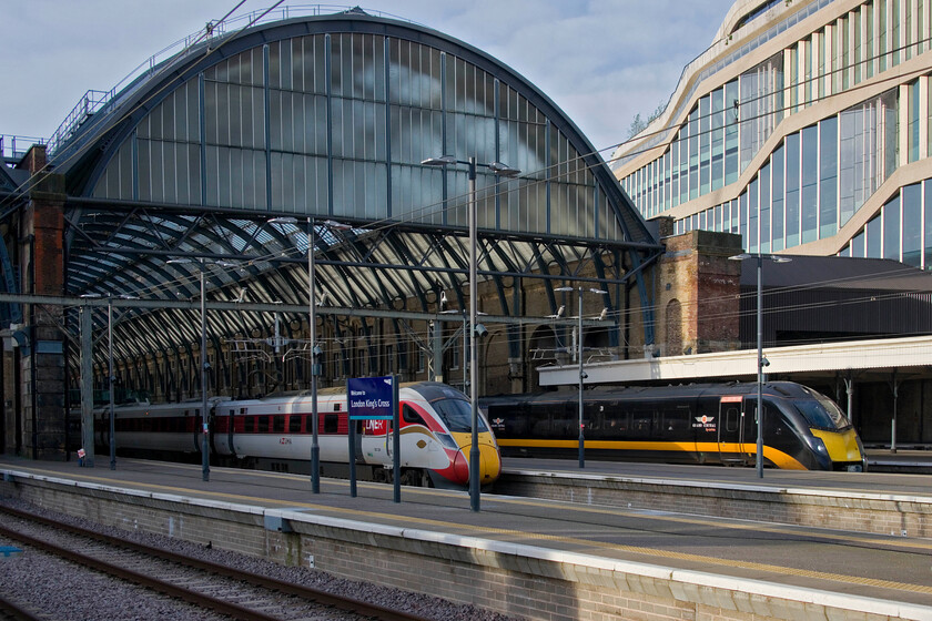 801228, 10.00 London King's Cross-Edinburgh Waverley (1S11, 4E) & 180104, GC 07.48 London King's Cross-Sunderland (1N90, 2L), London King's Cross station 
 Despite the ASLEF strike affecting the ECML there were still some trains running. Control managed to get 801228 out and it is seen sitting at King's Cross ready to work the 1S11 10.00 service to Edinburgh. Meanwhile, Grand Central trains were running as usual despite the industrial action. A well-loaded (from what I could see through the windows) 180104 departs with the 07.48 service to Sunderland 
 Keywords: 801228 10.00 London King's Cross-Edinburgh Waverley 1S11 180104 07.48 London King's Cross-Sunderland 1N90 London King's Cross station Grand central LNER Azuma