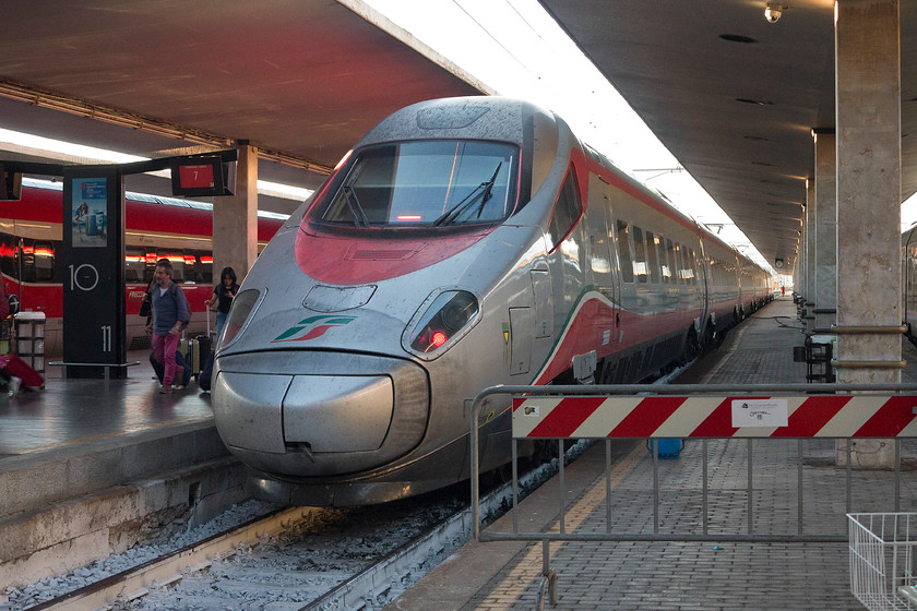 600.007, 17.20 Milan C-Rome T (9549), Florence SMN station 
 Passengers disembark from the 9549 17.20 Milan Central to Rome Termini service at Florence SMN. The train is being worked by one of Trenitalia's Frecciargento high speed trains 600.007. 
 Keywords: 600.007 17.20 Milan C-Rome T 9549 Florence SMN station