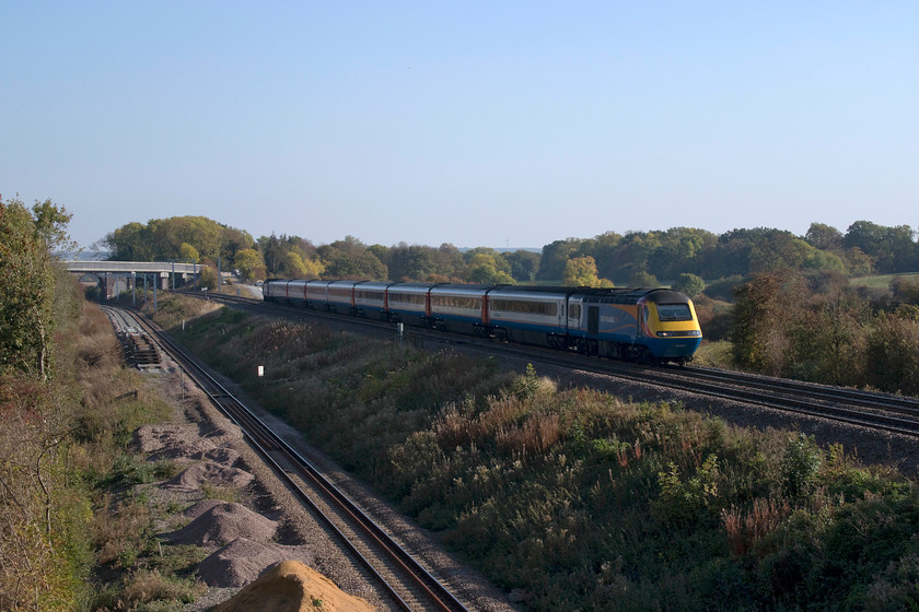 43089 & 43083, EM 14.34 London St. Pancras-Nottingham (1D42, 4L), Souldrop Back Lane bridge 
 43089 and 43083 power the 14.34 St. Pancras to Nottingham up Sharnbrook Bank past the tiny village of Souldrop just north of Sharnbrook Junction. The picture is taken from a temporary bridge constructed by Network Rail in connection with another set of bridge works on Back Lane. During the initial works associated with the electrification, the bridge was raised and a lot of work done including the installation of some enormous parapets. Now, the rest of the bridge is being demolished and re-built due to structural defects. I'm sure that the defects were present a couple of year ago, quite why it wasn't all done then I'm not so sure? 
 Keywords: 43089 43083, EM 14.34 London St. Pancras-Nottingham 1D42 Souldrop Back Lane bridge