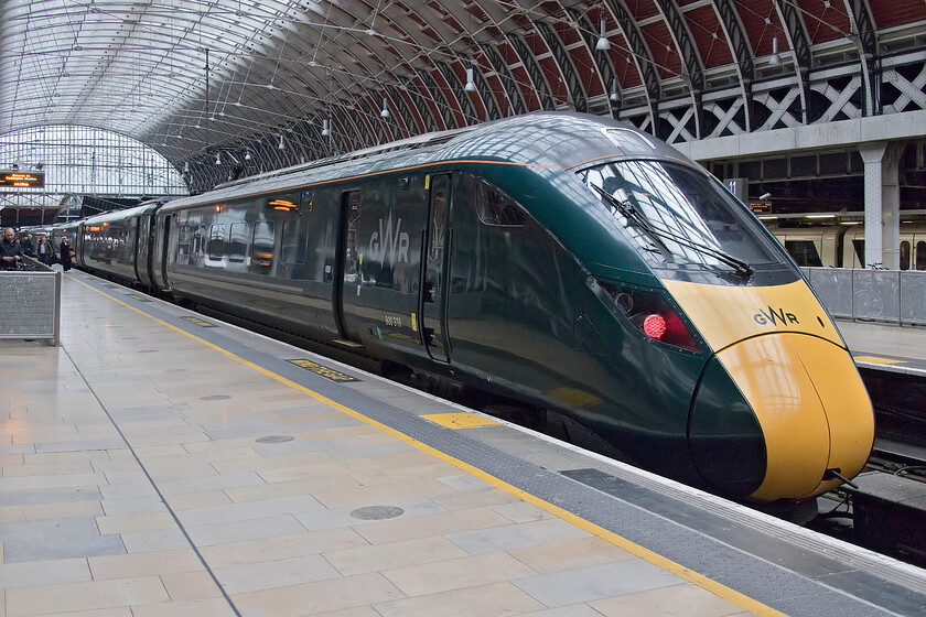 800318, GW 10.55 Paignton-London Paddington (12.49 Westbury-London Paddington) (1A81, 1L), London Paddington station 
 On arrival at London Paddington, I turned my camera round to capture IET 800318 on which I had travelled from Westbury. As the 1A81 10.55 from Paignton, the train arrived on time and provided a good service with the on-board wifi working well but with no trolley service and the standard hard seating! 
 Keywords: 800318 10.55 Paignton-London Paddington 1A81 London Paddington station