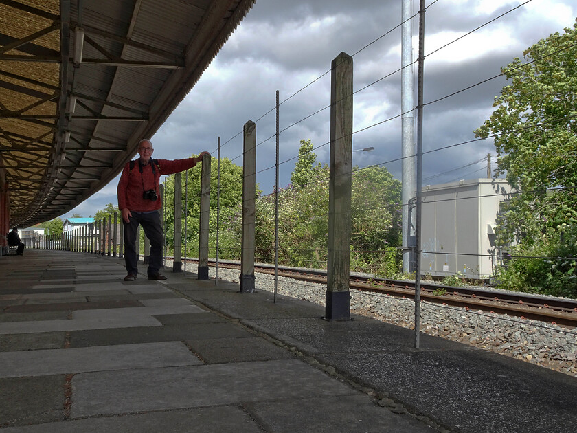 Andy, former platform 1, Westbury station 
 Andy poses on the former platform one at Westbury station. This was taken out of use many years ago and the twin tracks were reduced to one and it was realigned. There have been discussions to re-open the platform for passenger use again but the cost estimate produced by Network Rail was out of all proportion with the the work needed. I think that they do this deliberately when they are confronted with a project that they are not in favour of. The reason for this image was an attempt to replicate an image taken in 1976, see.... https://www.ontheupfast.com/p/21936chg/24049436004/b578-class-119-dmu-westbury-station 
 Keywords: Andy former platform 1 Westbury station