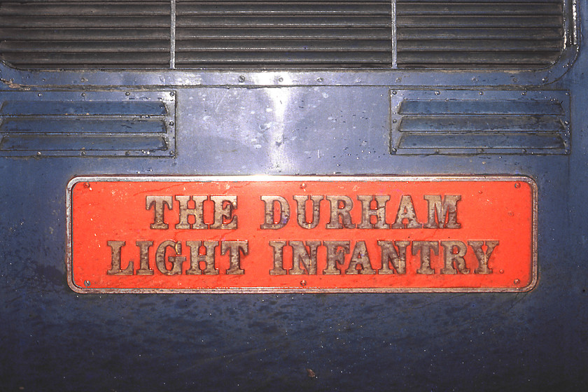 Nameplate, 55 017, 17.05 London King's Cross-Hull (1D04), Hull station 
 The nameplate attached to the side of 55017 as it stands at Hull Paragon having arrived with the 17.05 service from King's Cross. Unsurprisingly, the locomotive was named with a ceremony at Durham station on 29.10.63. This name was previously carried by LNER 'V2' No. 60964. Almost exactly a month after this photograph was taken 55017 was involved in a serious collision at Finsbury Park that almost made it the fourth member of the class to be withdrawn. However, extensive repairs to its number one end were authorised that saw a team at Doncaster make a new one from scratch. 
 Keywords: Nameplate 55 017 17.05 London King's Cross-Hull 1D04 Hull station Deltic The Durham Light Infantry