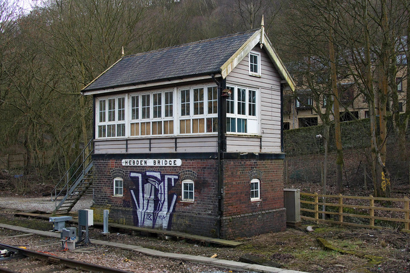 Hebdon Bridge signal box (L&Y, 1891) (Closed) 
 Built in 1891, Hebdon Bridge signal box is one of only a few remaining L&YR signal boxes to survive in anything like original condition. So much so that in July 2013, it was one of 26 'highly distinctive' signal boxes listed by Ed Davey, the minister for the Department for Culture, Media and Sport, in a joint initiative by English Heritage and Network Rail. The box was decommissioned a few months ago when the Calder Valley re-signalling scheme rendered it redundant. Already, it has been attacked by vandals so I hope that the Friends of Hebden Bridge Station and the Calder Valley Community Land Trust can get things organised to preserve it better for the future. 
 Keywords: Hebdon Bridge signal box