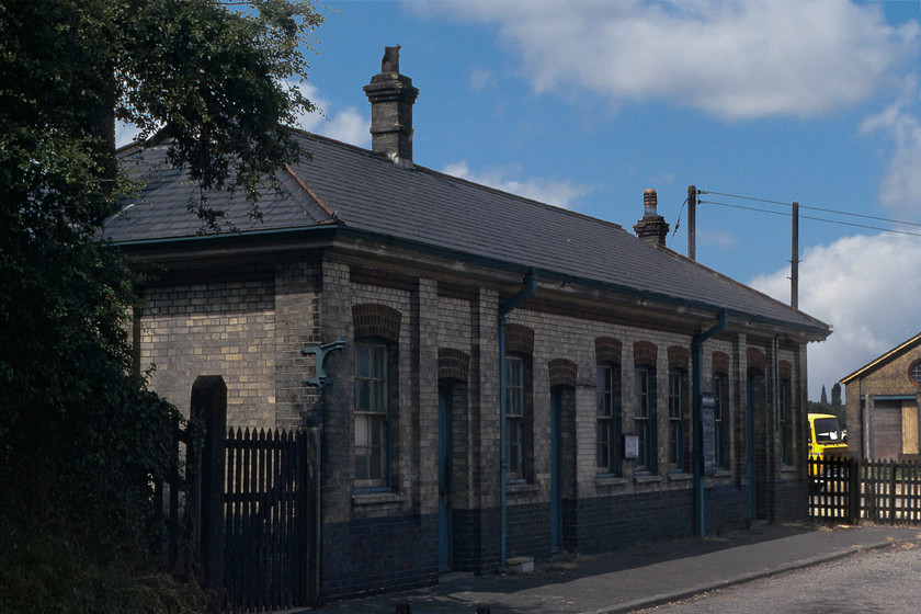 Frontage, Little Bytham station (Closed 15.06.59) 
 The former station at Little Bytham is charming Great Northern structure that closed in June 1959, twenty years prior to this photograph being taken. Despite this, there is a British Railways enamel notice board still attached to the front of the building. Notice in the background the former goods shed and the BR yellow truck that close examination reveals to be a Leyland. 
 Keywords: Frontage Little Bytham station