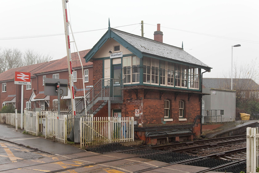 Wainfleet Signal Box (GN, 1889) 
 Wainfleet signal box is located between the platform end and the level crossing in the large Fenland village of Wainfleet All saints. It was constructed by the GNR in 1889 to their Type I design. This is of a more simple design than some of their more ornate types with, for example, plain barge boarding and less ornate windows. This structure, like several on the Skegness route, is Grade II listed by English Heritage so when it comes to the end of its life in 2020, its future is more secure. 
 Keywords: Wainfleet Signal Box GN 1889