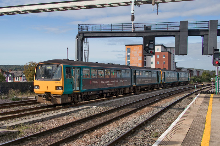 143605 & 143609, AW 09.38 Merthyr Tydfil-Bridgend (2E20, 3L), Cardiff Central station 
 Double trouble in the form of a pair of Pacer class 143s leave Cardiff Central with the 2E20 09.38 Merthyr Tydfil to Bridgend service. The trailing unit is 143605 with the leading one being 143609, formally named after the famous local resident 'Sir Tom Jones'. If I was him, I think that I would have been a bit miffed if a lowly Pacer was named after me! 
 Keywords: 143605 143609 09.38 Merthyr Tydfil-Bridgend 2E20 Cardiff Central station