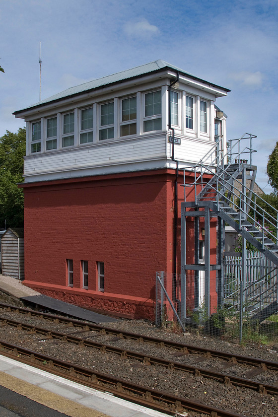 Dyce (ex Dyce Junction) signal box (GNS, 1880) 
 The impressive Dyce signal box stands proudly at the end of the up platform. Despite its recent modernisation, it unmistakably of an earlier GNSR design being of their Type 1 design having a brick base and a hipped roof. The box once controlled a very important junction where branches serving the termini at Fraserburgh, Peterhead and Boddam diverged from the Aberdeen to Keith and Elgin line. Today it has a mini panel and marks the start of a long section of single track to Inverurie. It is also adjacent to the very busy Aberdeen airport with direct access from the station the east terminal. The box is due to be superseded in the coming few years when the single track is doubled and complete resignalling is introduced. I hope that the box is preserved as it is such an early and very rare example of this type. 
 Keywords: Dyce Dyce Junction signal box Great North of Scotland railway GNS