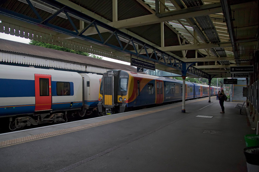 450081, SW 17.47 London Waterloo-Southampton Central (1B93, 2E), Winchester station 
 450081 arrives at Winchester station with the 17.47 Waterloo to Southampton Central. The station was well looked after and shows a healthy increase in patronage up to over five million over 2016-2017. 
 Keywords: 450081 1B93 Winchester station