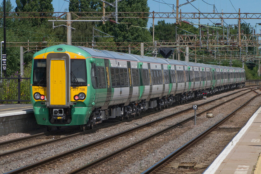 377708 & 377707, 10.33 Wembley-Rugby crew training, Northampton station 
 The new dual voltage five-car 377/7 subset of the highly successful Electrostars are due to enter service with Southern later this year (2014). 377708 and 377707 pass through Northampton working the 10.33 Wembley to Rugby crew training run. Whilst in this scene they are working on 25kV AC they are also capable of working on the 650V DC used on the Southern network. 
 Keywords: 377708 & 377707, 10.33 Wembley-Rugby crew training, Northampton station