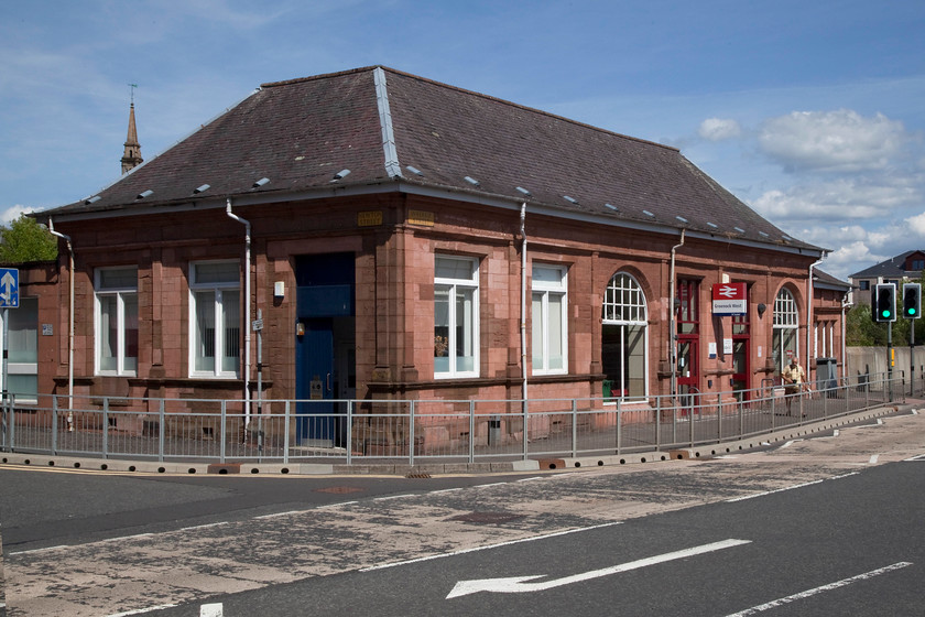 Frontage, Greenock West station 
 Greenock West station opened in 1889 being bult by the Caledonian Railway. The elegant and neat station building is at street level on Inverkip Street. However, the railway is some distance below street level that requires a decent down some rather dingy steps to platform level. 
 Keywords: Frontage Greenock West station