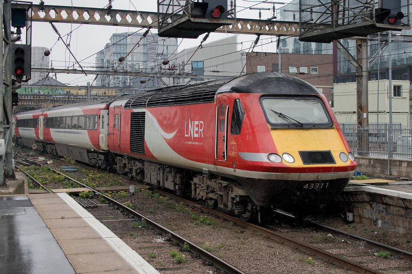 43311, GR 11.20 Edinburgh-London King`s-Cross (1E95, 12L), London King`s Cross station 
 The 1E95 11.20 from Edinburgh pulls slowly into London King's Cross having completed its 392 mile journey, one that it has done thousands of times. However, this is all about to change over the coning few months as the Azumas finally enter service on the ECML opening up another chapter in the line's long and varied history. 
 Keywords: 43311 11.20 Edinburgh-London King`s-Cross 1E95 London King`s Cross station