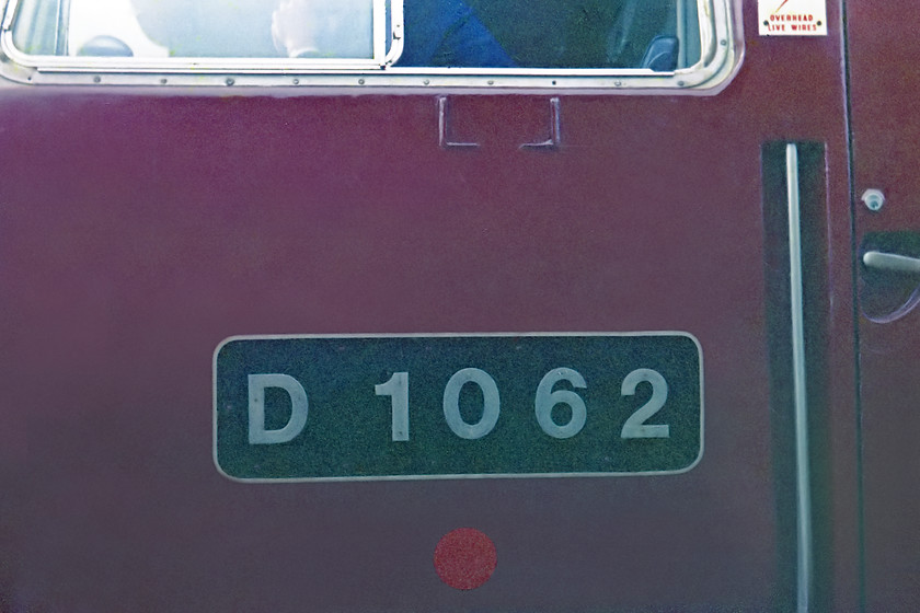 Numberplate, D1062, Churston station 
 Not a very good shot due to initial poor exposure but one that I have resurrected using some extensive Photoshop work! It shows the numberplate of D1062 'Western Courier' standing at Churston station heading the 16.00 Paignton to Kingswear train. 
 Keywords: Numberplate D1062 Churston station