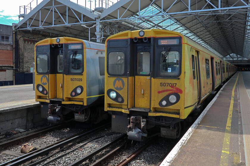 507017 & 507001, ME 15.27 Southport-Hunts Cross (2U40, 5L) & 507029, ME 15.42 Southport-Hunts Cross (2U41, 2L), Southport station 
 The old order still prevails at Southport! To the left 507029 will work the 15.42 service to Hunts Cross whilst to the right 507017 and 507001 will soon leave working the 15.27 to Hunts Cross. Andy and I travelled aboard the 15.27 all the way back to Liverpool South Parkway to pick up the car and continue our journey north. This will almost certainly be my last journey on one of these venerable units that have been in operation from new around Merseyside for forty-three years now. 
 Keywords: 507017 507001 15.27 Southport-Hunts Cross 2U40 507029 15.42 Southport-Hunts Cross 2U41 Southport station Merseyrail