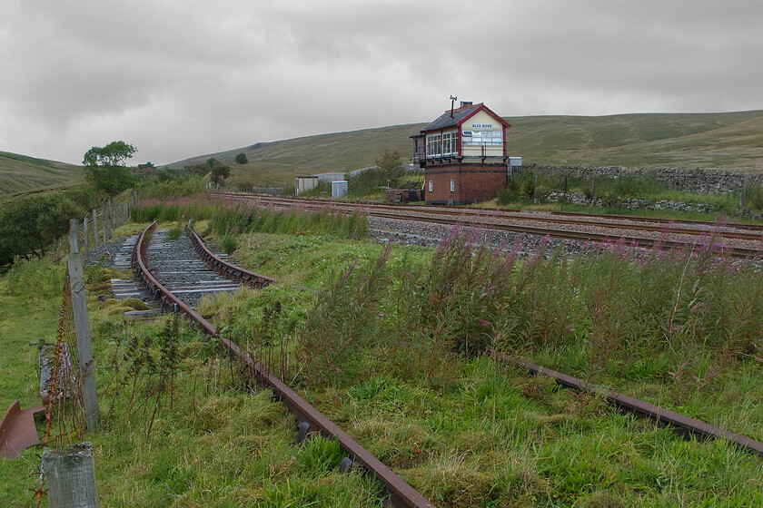 Blea Moor, looking north 
 A final view of Blea Moor signal box just before I head back towards Ribblehead to meet up with Andy again. This view makes clear why the box is dubbed Britains most remote signal box see..... https://www.networkrail.co.uk/stories/meet-britains-most-remote-signal-box/ Whilst the race to modernise signalling continues apace plans to re-signal this incredible railway line are some year away yet. 
 Keywords: Blea Moor looking north