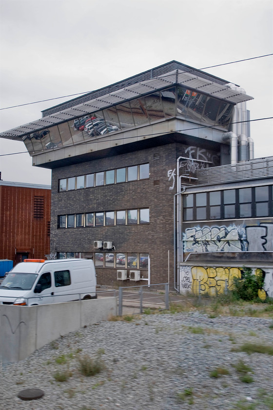 Copenhagen Central signal box 
 What I believe to be Copenhagen Central signal box is located on the southern approach to the station. It offers a commanding view of the large yard behind where I am taking the picture from and is a typically European design! If anybody has any further information about the structure please contact me. 
 Keywords: Copenhagen Central signal box